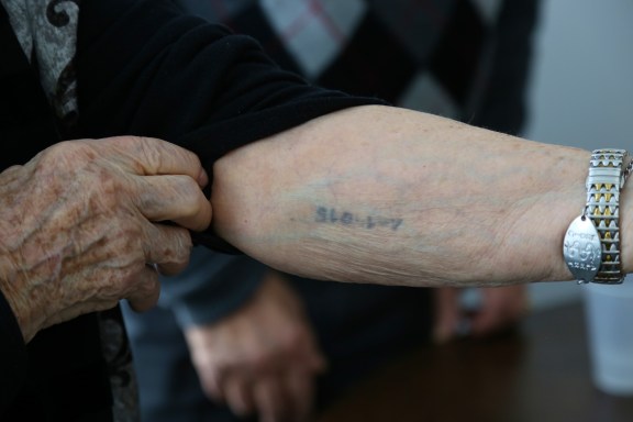 Nancy Kleinberg, A-14015. "I also got a tattoo. Mengele sat there. The girl (who tattooed me) was so rough. It was so painful. She slapped me in the face." (Michel Botman Photography, Toronto, February 2013)