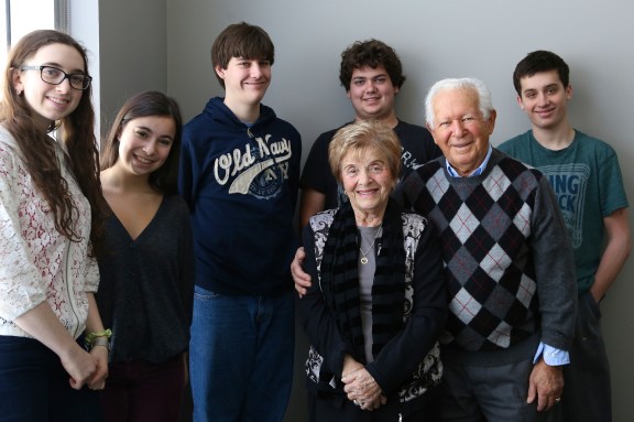 Nancy and Howard Kleinberg with Jewish teenagers about to embark on "The March of the Living" (Michel Botman Photography, Toronto, February 2013)